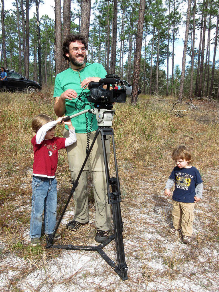 WFSU producer Rob Diaz de Villegas trains new production assistants in the Munson Sandhills of the Apalachicola National Forest.