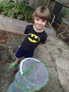 My son Max preparing to release six monarch butterflies raised in our house.