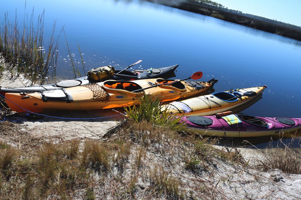 Kayaks beached by a camp site in Bald Point State Park.