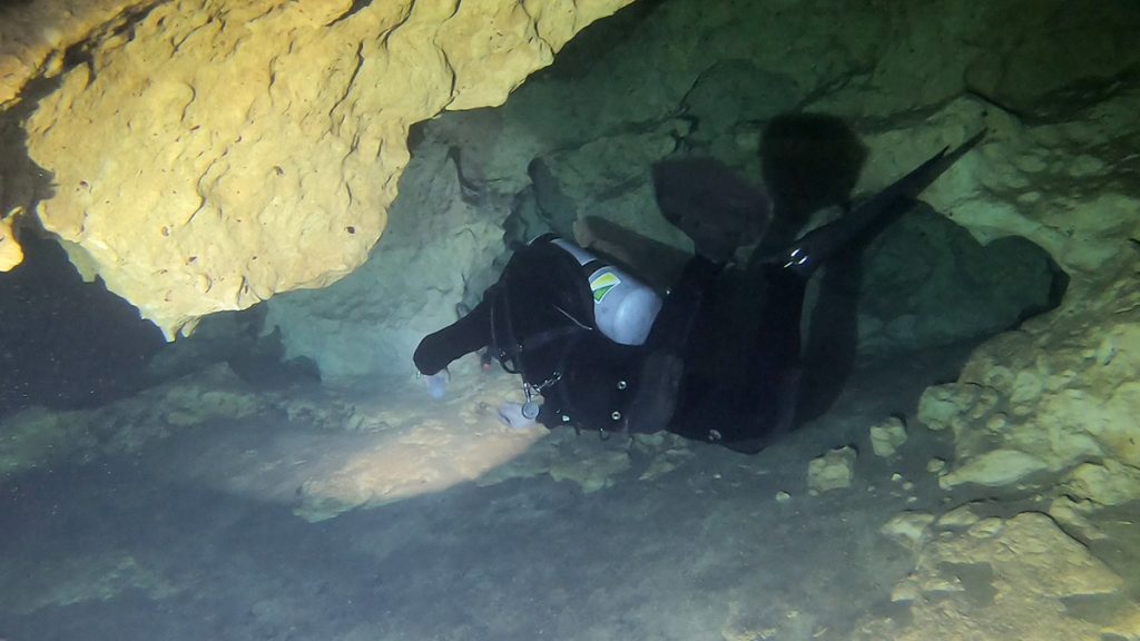 Diver in Hole in the Wall Cave, under Merritt's Mill Pond in Jackson County, Florida.