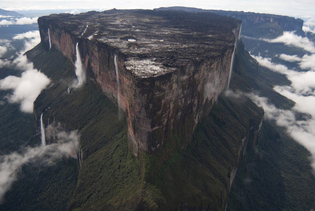 Mount Roraima from above.  Note the waterfall- another tepui waterfall, Angel Falls, inspired the fictional paradise falls of the Pixar movie Up.