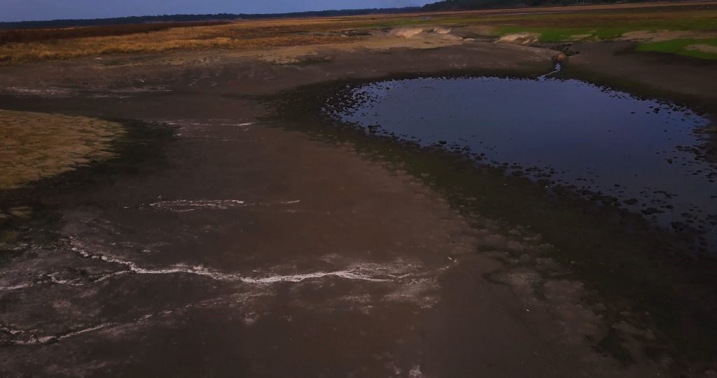 Mud flats in a dried down Lake Jackson, December 2022.